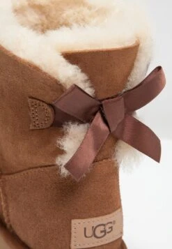Ugg Mini Bailey Bow - Classic Ankle Boots - Chestnut 12 Ugg Mini Bailey Bow - Classic Ankle Boots - Chestnut -Shein Fashion Store dc837f11fb394740b368d93a7fa98366