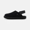 Ugg GOLDENSTAR UNISEX - Mules - Black